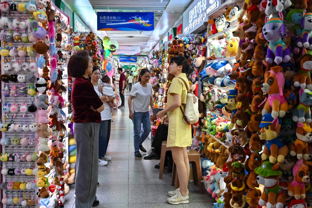 Vendors and buyers are seen at the Yiwu International Trade Market, a vast emporium for wholesale goods often dubbed the “world’s supermarket”, in Yiwu, Zhejiang province. The city has recorded strong growth in exports this year despite the US-China trade war. Photo: AFP