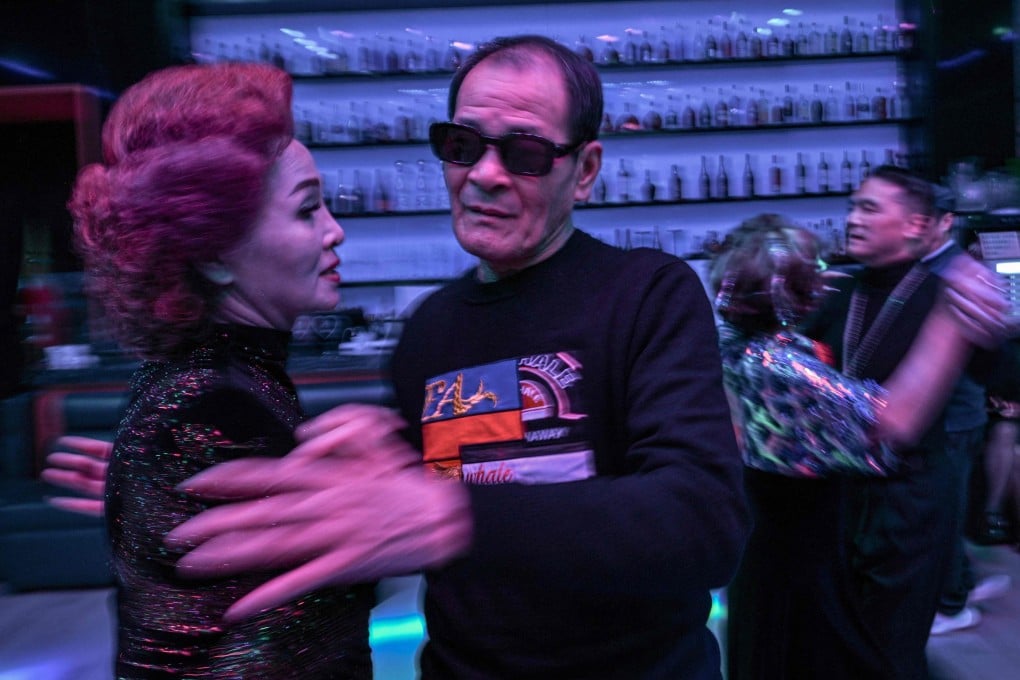 Guests dance at the Shiguang Dance Hall in Shanghai. The city’s dance halls offer retirees vibrant social spaces to exercise and connect. Photo: AFP