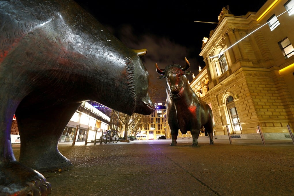 Statues of a bull and a bear face off in front of the German stock exchange in Frankfurt. Photo: Reuters