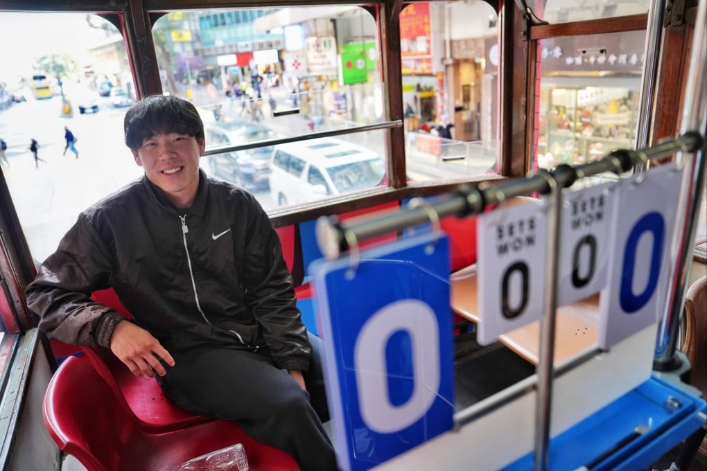 Coleman Wong enjoys his ride on a Hong Kong Open themed tram. Photo: Elson Li