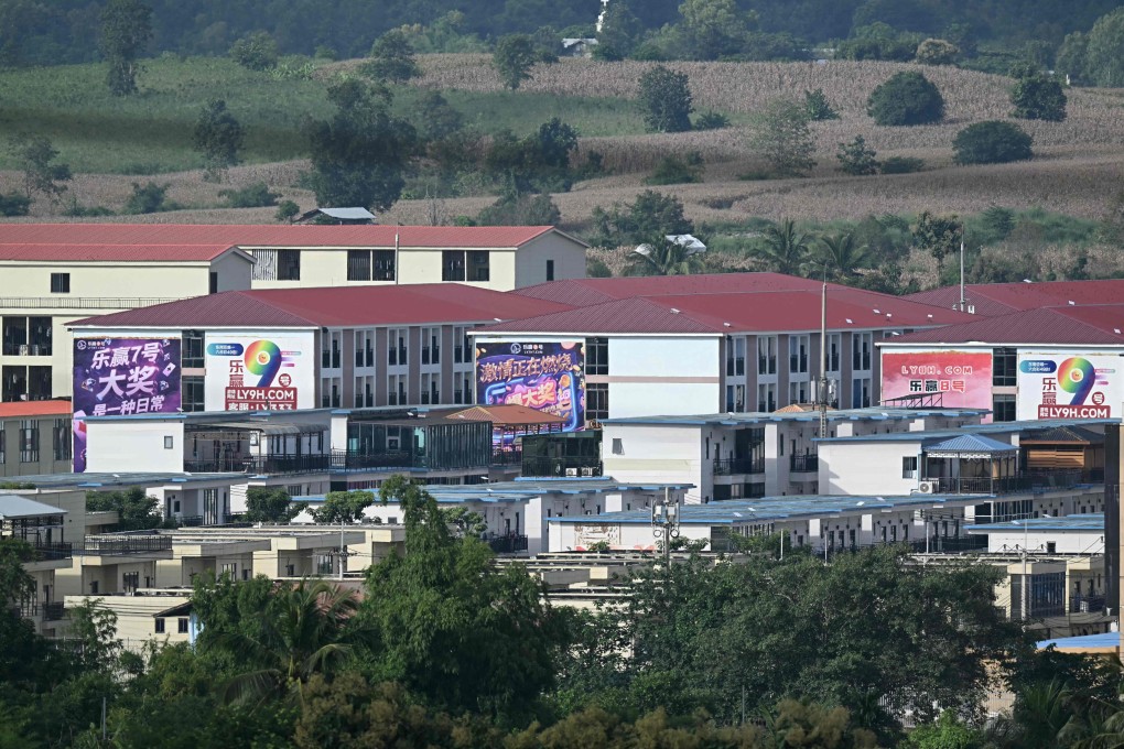 Advertisements for gambling sites and what appears to be Starlink satellite dishes on the roofs of buildings at the notorious KK Park complex in Myanmar’s eastern Myawaddy township, as pictured from Mae Sot district in Thailand’s border province of Tak, on September 17. Photo: AFP