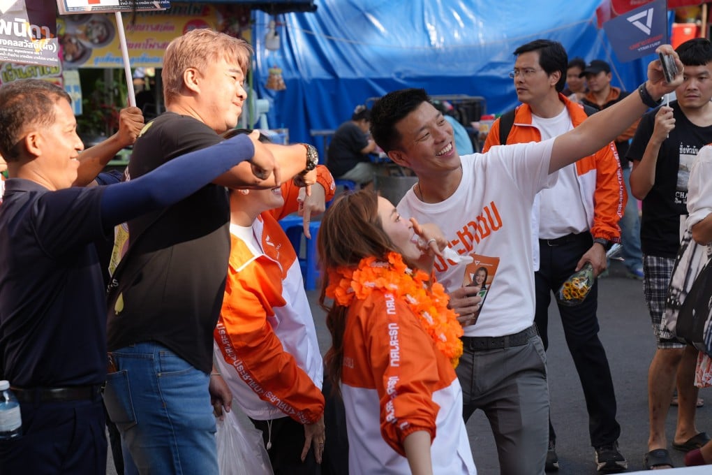 Natthaphong Ruengpanyawut, leader of the People’s Party, on the campaign trail this week in Thailand. Photo: Aidan Jones