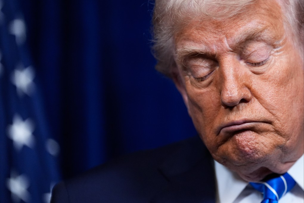 US President Donald Trump closes his eyes during a news conference at Mar-a-Lago in Palm Beach, Florida, on Sunday. Photo: AP
