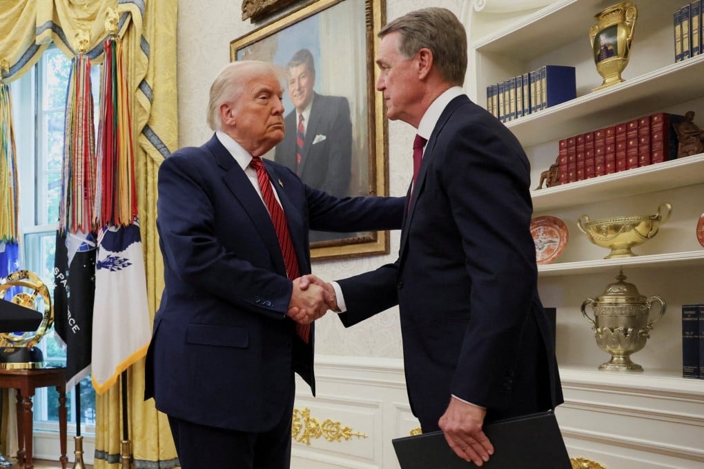 US President Donald Trump shakes hands with David Perdue during Perdue’s swearing-in ceremony as the US Ambassador to China at the White House in May. The pair are set to meet at Trump’s Mar-a-Lago estate in Florida on Friday. Photo: Reuters
