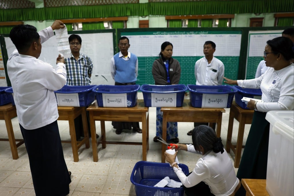 Electoral officers count early voting ballots after closing the first phase of Myanmar’s general election at a polling station in Naypyitaw, on December 28. Photo: EPA
