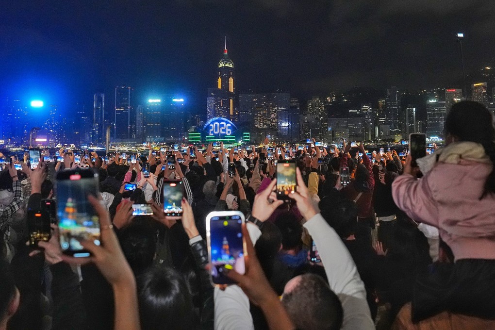 Crowds packed Tsim Sha Tsui’s promenade to ring in the new year. Photo: Elson Li