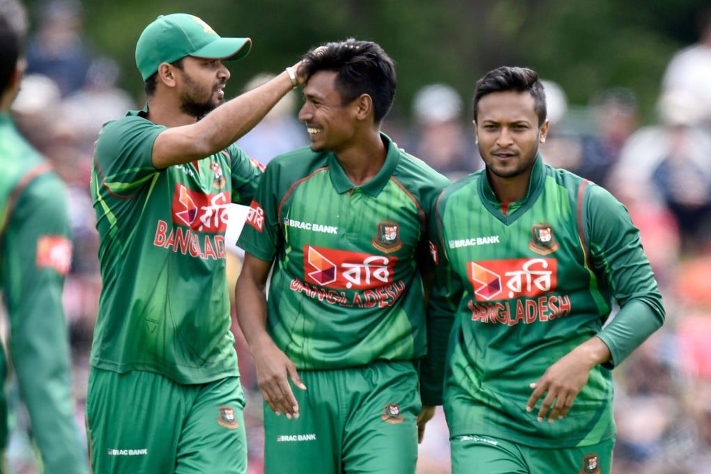 Bangladesh’s Mustafizur Rahman (centre) has been kicked out of the IPL by the India cricket bosses. Photo: AFP