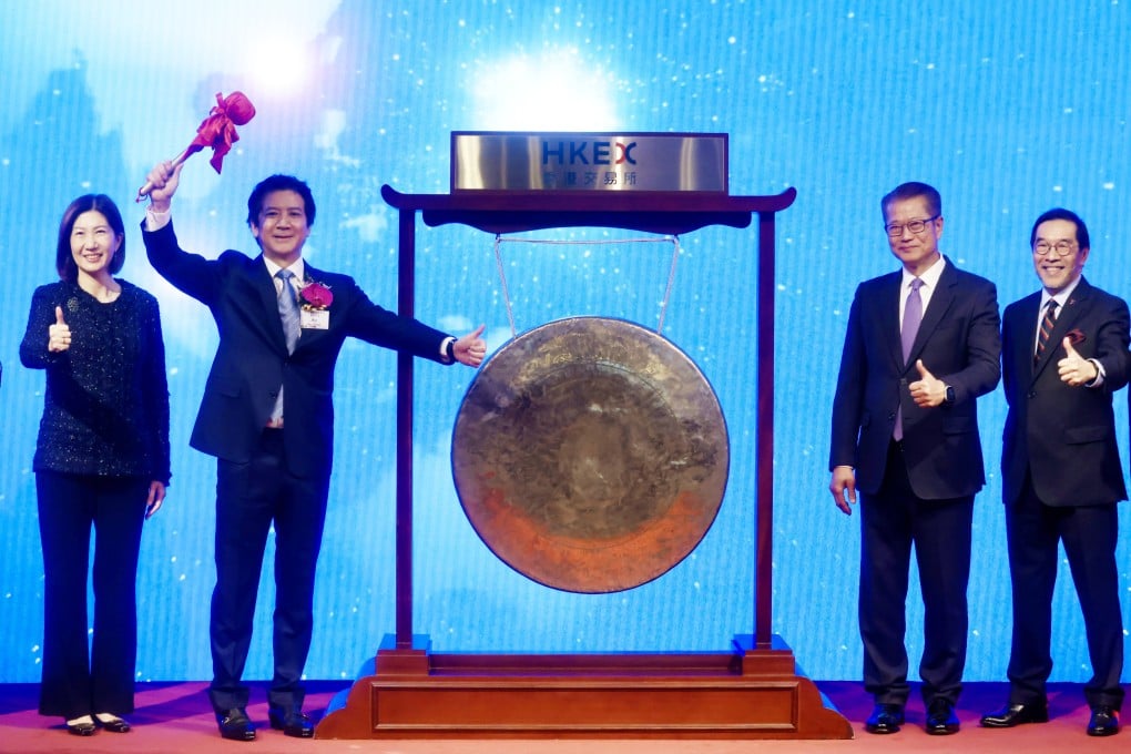 Financial Secretary Paul Chan (second from right) attends the listing ceremony for Biren Technology with the firm’s CEO Zhang Wen (second from left). Photo: Jonathan Wong