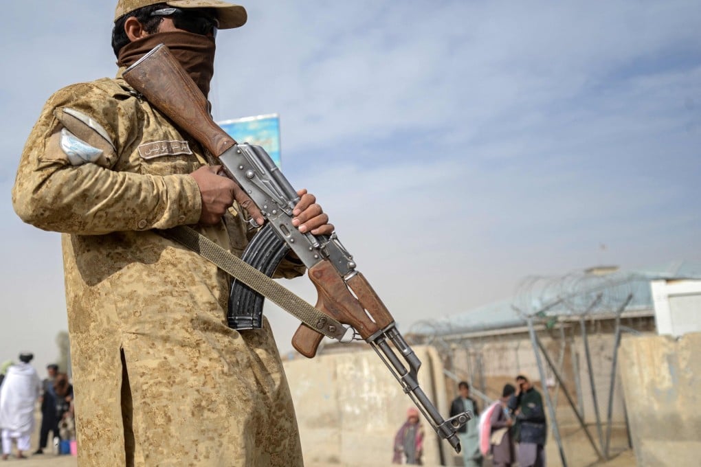 A Taliban security personnel stands guard near the Afghanistan-Pakistan border crossing at the Spin Boldak district of Kandahar province on Monday. Photo: AFP