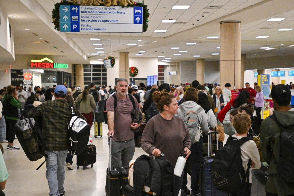 Passengers wait at the Luis Munoz Marin International Airport in Puerto Rico on Saturday. Photo: AFP