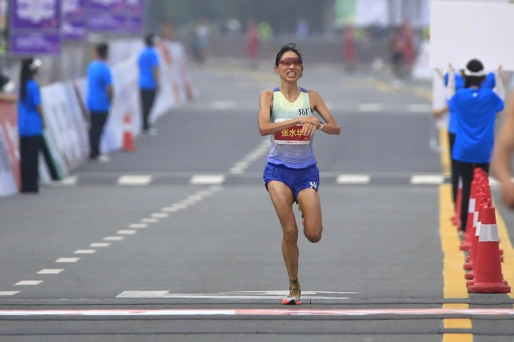 On August 31, Zhang Shuihua, a Chinese runner participating in the women’s race of the 2025 Harbin Marathon, reached the finish line. (Xinhua)