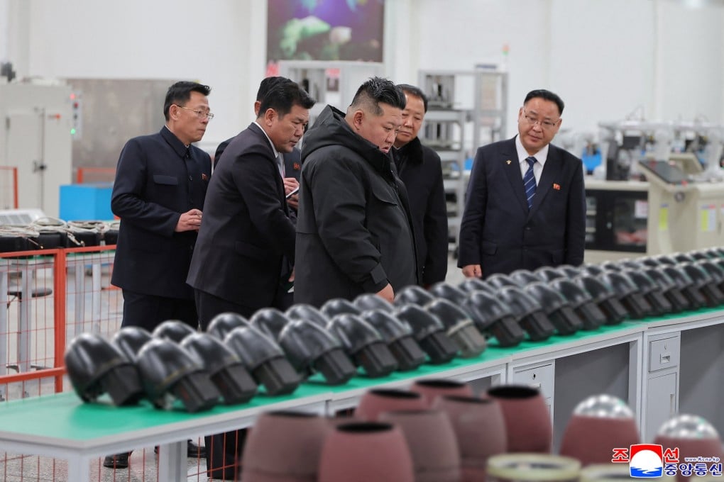 North Korean leader Kim Jong-un visits a military factory and inspects the production status of tactical guided weapons. Photo: KCNA via Reuters