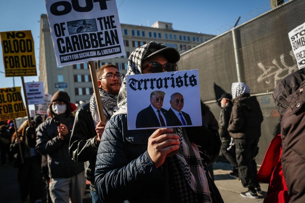 People take part in a demonstration against US military action in Venezuela, outside the Metropolitan Detention Centre, where ousted Venezuelan president Nicolas Maduro is being held, in the Brooklyn borough of New York City, on January 4. Photo: AFP