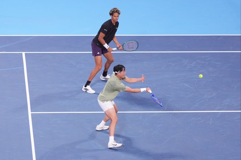 Gabriel Diallo (top) and Coleman Wong competing in the Hong Kong Open doubles on Monday. Photo: Eugene Lee