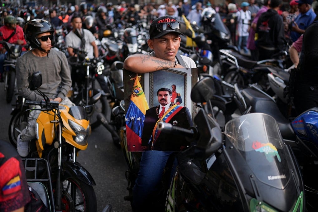 Members of the militia group known as ‘Colectivos’ take part in a march in Caracas, Venezuela, calling for the release of President Nicolas Maduro and his wife. Photo: Reuters