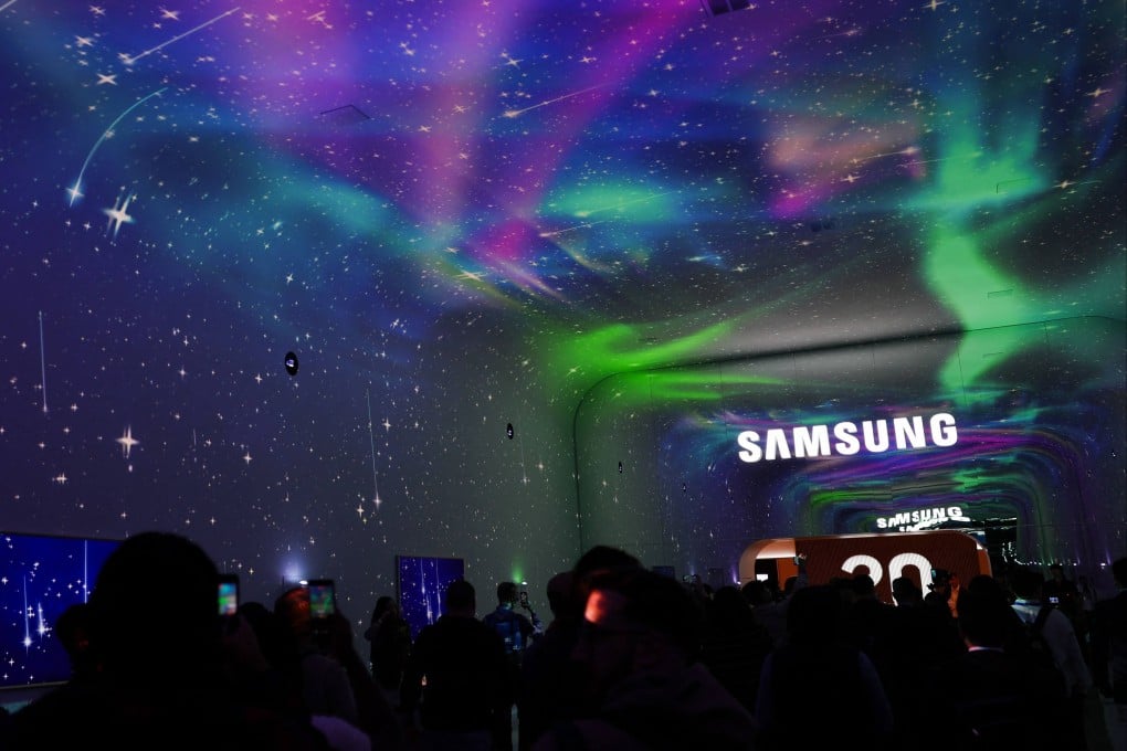 The Samsung logo is displayed as people enter a preview event ahead of the Consumer Electronics Show in Las Vegas on Sunday. Photo: AFP