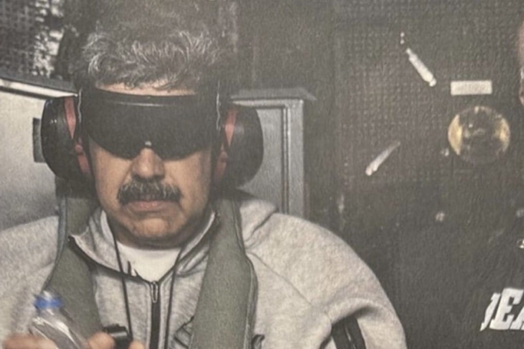 Venezuela’s Nicolas Maduro in US custody wearing a Nike tracksuit. Photo: White House via EPA