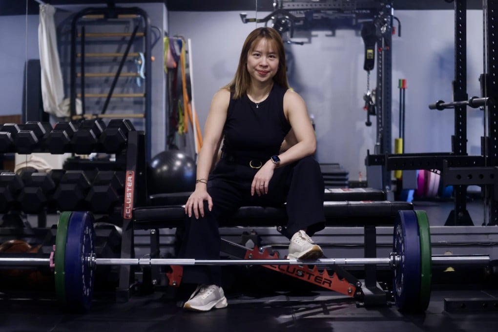 Record-breaking Hong Kong powerlifter Jaclyn Hei Tsang is pictured at a private gym in Quarry Bay, Hong Kong, on December 29, 2025. Also a dietitian, personal trainer, author and PhD candidate, she tackles online health myths and bad advice on her Instagram page, @fitness_dietitian_hk. Photo: Jonathan Wong