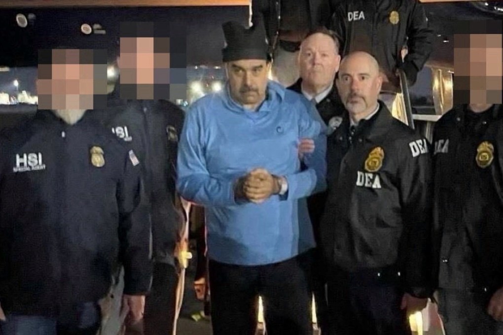 Venezuela’s Nicolas Maduro is led into custody by US Drug Enforcement Administration officers at an airbase in New York on Saturday. Photo: Handout/Reuters