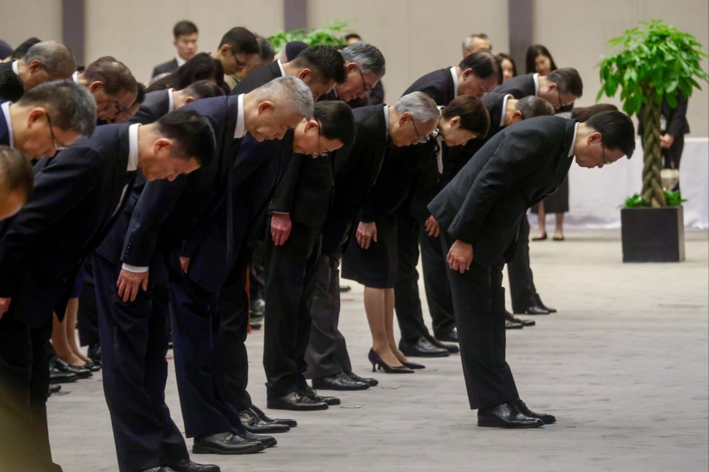 Chief Executive John Lee Ka-chiu and government officials at the ceremony of the Nanking massacre memorial held at the government’s headquarters on December 13. Photo: Jonathan Wong