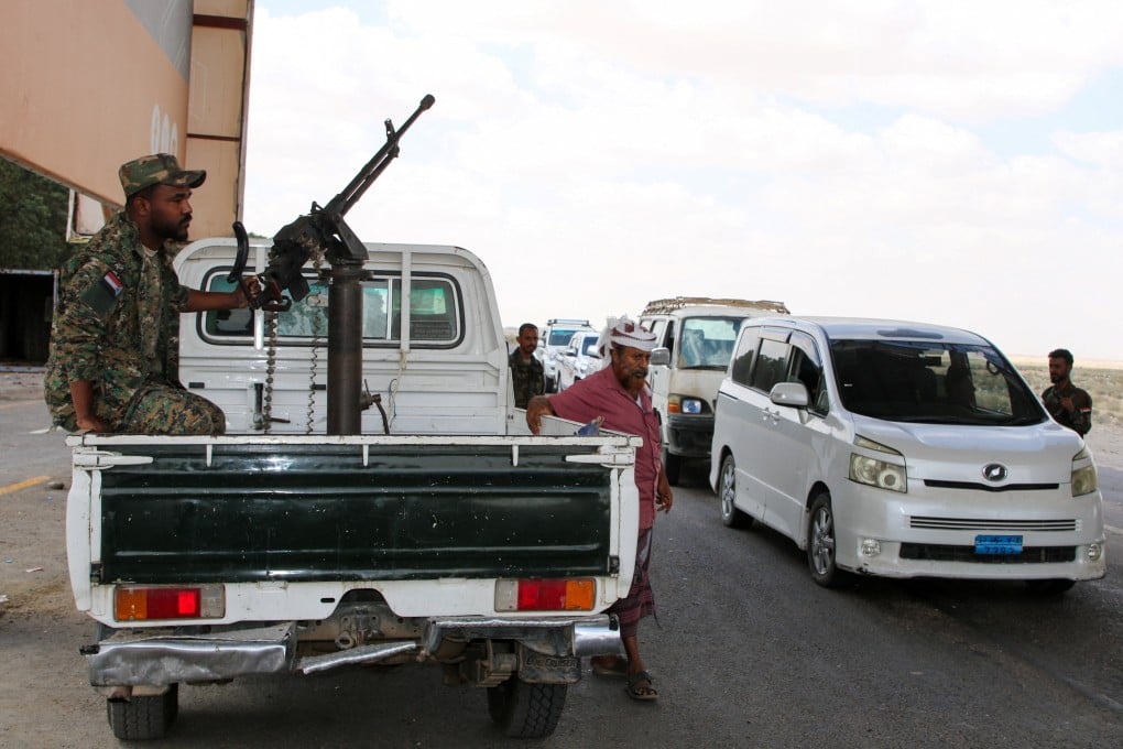 Southern Transitional Council security personnel guard a checkpoint in Aden, Yemen, on Monday. Photo: Reuters