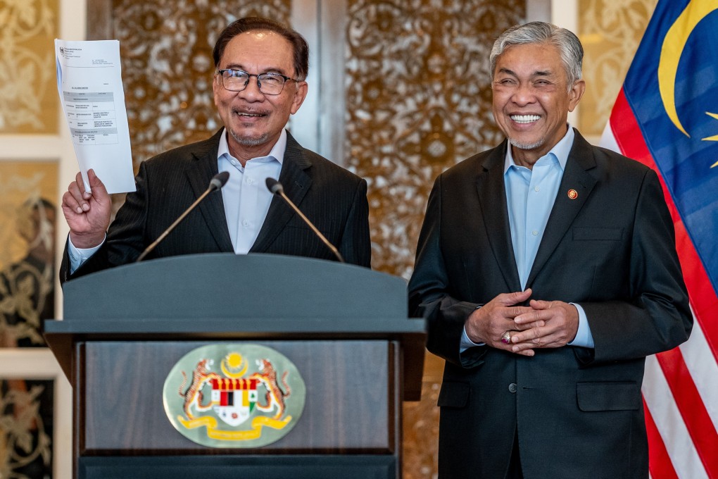 Prime Minister Anwar Ibrahim (left) announces his cabinet reshuffle in December 2023 alongisde Deputy Prime Minister Ahmad Zahid Hamidi: Photo: Prime Minister’s Office of Malaysia