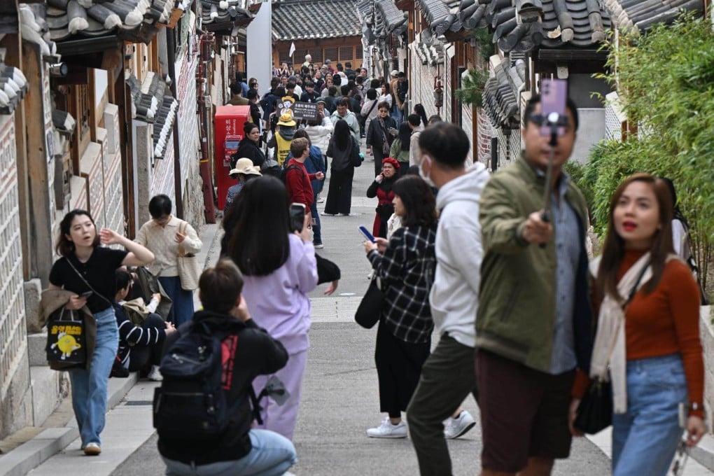 An alley crowded with tourists in central Seoul’s Bukchon Hanok Village. Photo: Korea Times