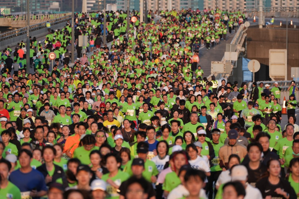 Local runners are struggling to find space to train at the city’s few remaining open public tracks ahead of the Hong Kong Marathon. Photo: Eugene Lee