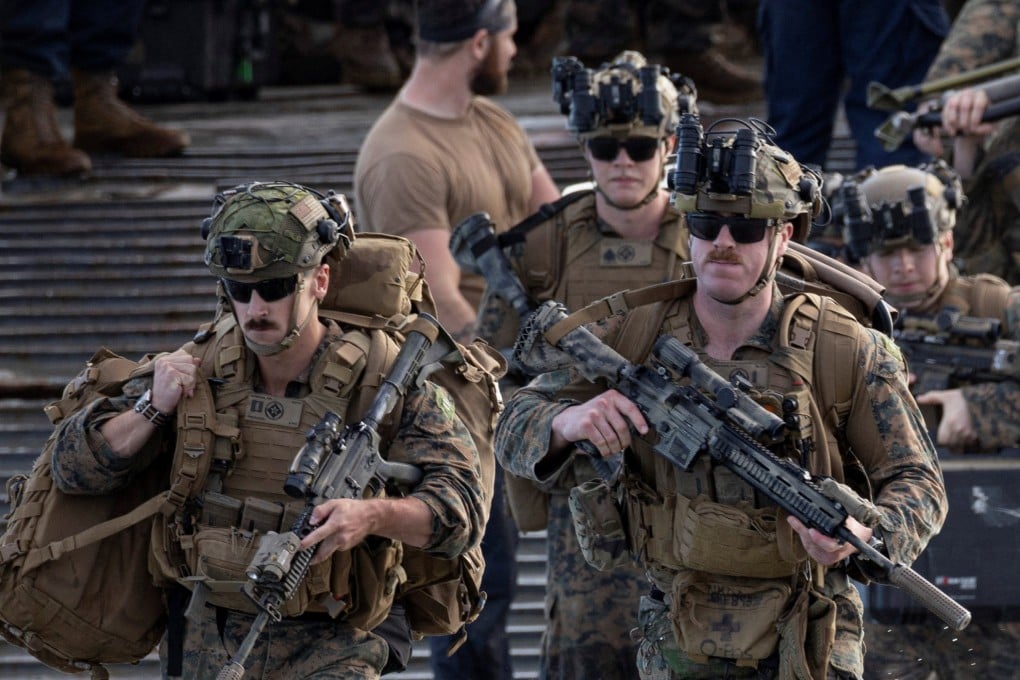 Marines disembark from a US Navy landing craft during amphibious operations in Arroyo, Puerto Rico, on December 9. Photo: Reuters