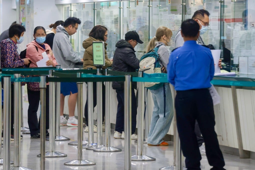 People at a Transport Department centre in Admiralty on January 8. Photo: Jonathan Wong