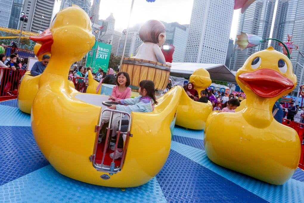 Children enjoy rides at the AIA Carnival at the Central Harbourfront on December 22, 2025. Photo: Jonathan Wong