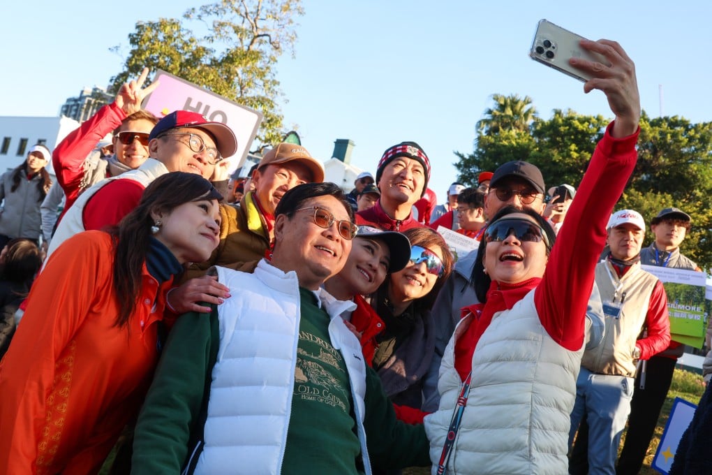 Frederick Ma poses with participants of a charity golf event. Photo: Dickson Lee