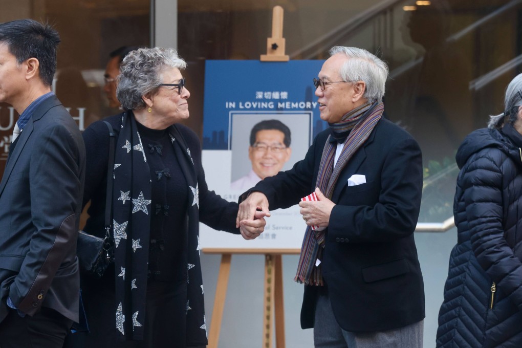 Ex-city leader Donald Tsang (right) at the memorial service for Gregory So. Photo: Jonathan Wong
