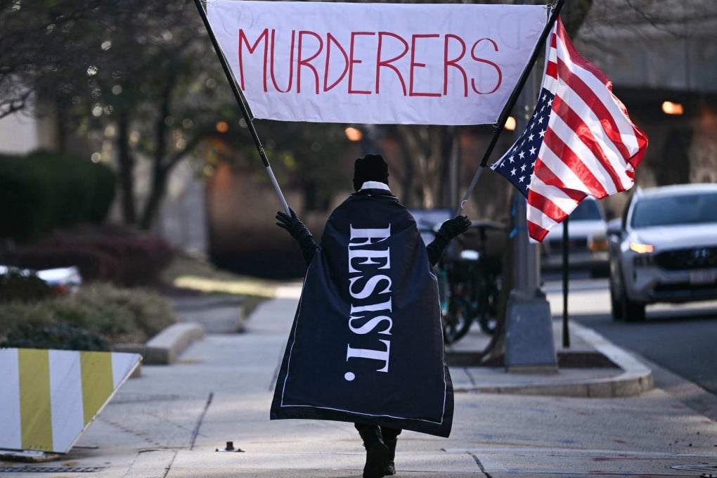 A demonstrator protests outside the US Immigration and Customs Enforcement building in Washington on Thursday. Photo: AFP