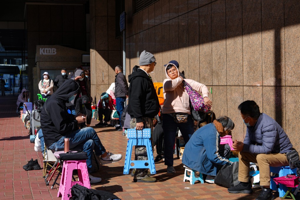 People queue overnight for test-free driving licence applications outside the Transport Department’s licensing office at United Centre, Admiralty, on January 7. Photo: Sam Tsang