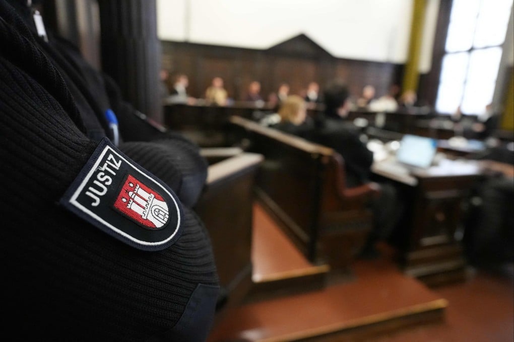 A justice officer is pictured ahead of the start of the “White Tiger” trial in Hamburg, Germany, on Friday. Photo: AFP