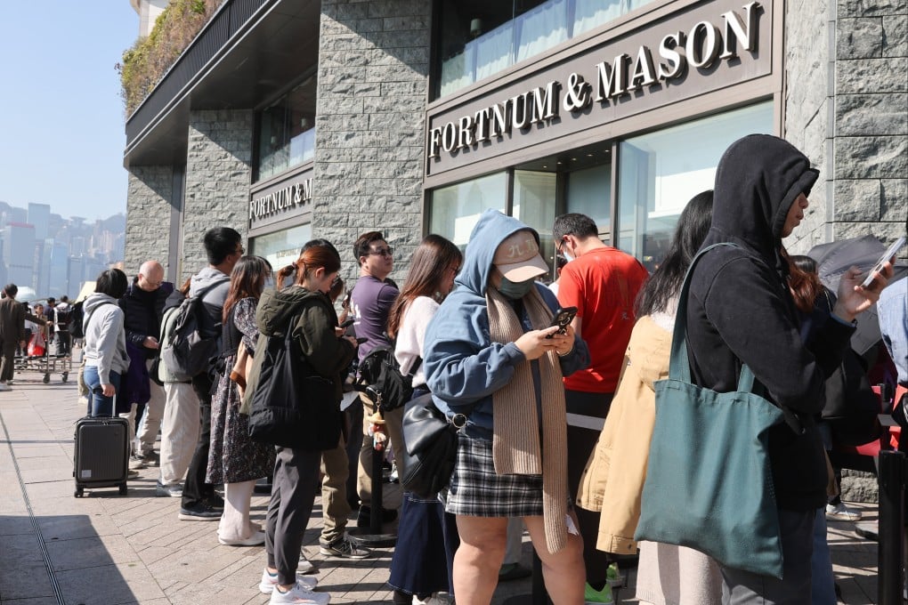 Hundreds of eager shoppers queue outside of Fortnum & Mason in Tsim Sha Tsui seeking bargains before the store closes on January 26.. Photo: Edmond So