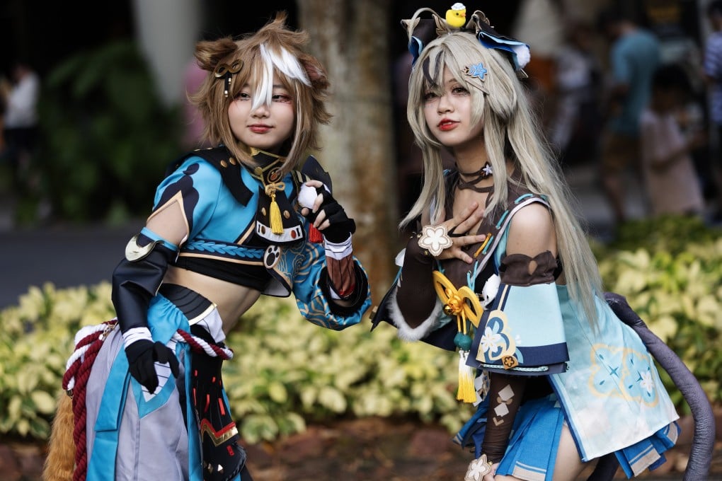 Anime cosplay enthusiasts pose for photos in Singapore in 2024. Photo: EPA-EFE