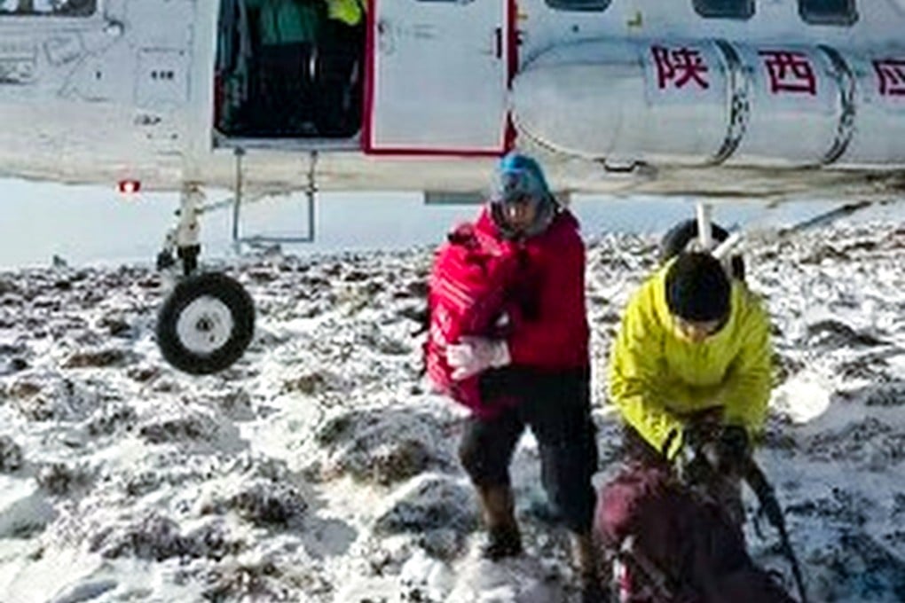 Rescuers and mountaineering officials in China’s General Administration of Sport warn that hikers should not be walking the Aotai Line after three people died on the trail recently. Photo: CCTV