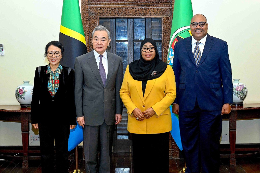 Chinese Foreign Minister Wang Yi (second from left) poses with Tanzanian President Samia Suluhu Hassan (second from right), Tanzanian Foreign Minister Mahmoud Thabit Kombo (right) and China’s ambassador to Tanzania Chen Mingjian (left) at the State House in Dar es Salaam on Saturday. Photo: AFP / State House Tanzania