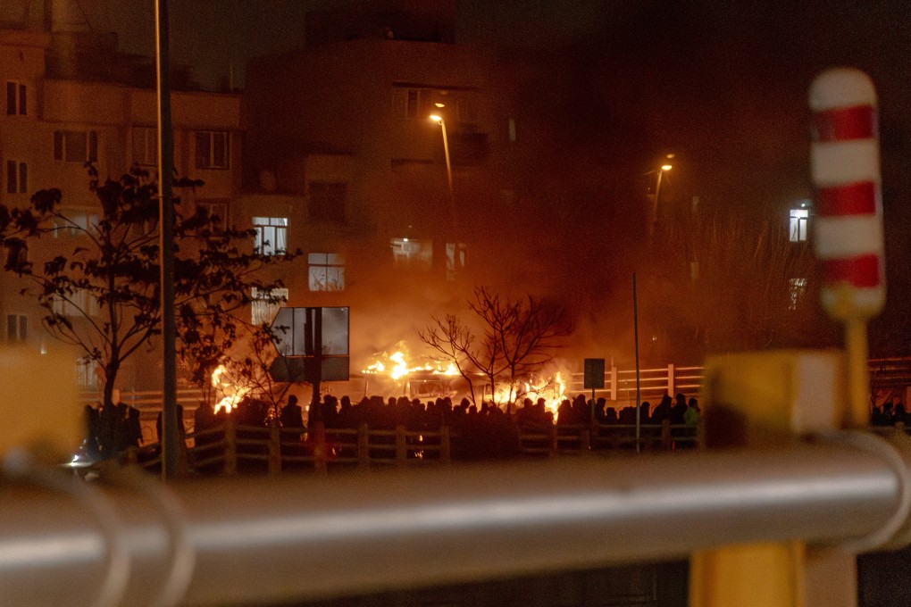 Iranians block a street during a protest in Tehran on Friday. Photo: AFP/Getty Images/TNS