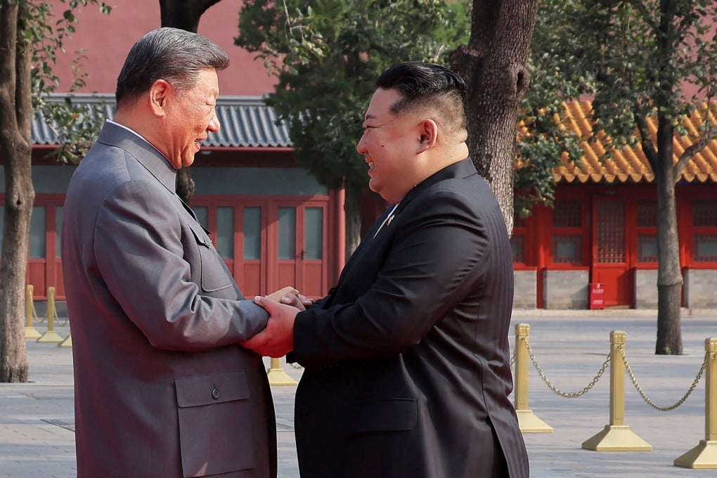 North Korean leader Kim Jong-un shakes hands with Chinese President Xi Jinping as they attend a military parade marking the 80th anniversary of the end of World War II in Beijing, China, in this picture released by the Korean Central News Agency on September 4. Photo: KCNA via Reuters