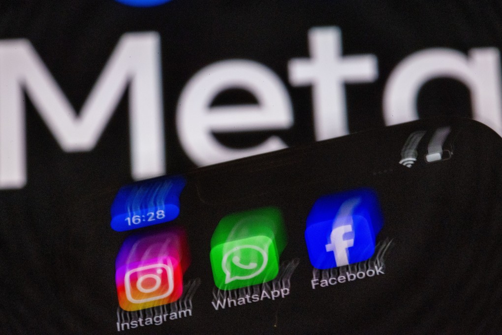 Logos of Instagram, Facebook, and WhatsApp apps are displayed on a smartphone in front of Meta’s logo. Photo: dpa
