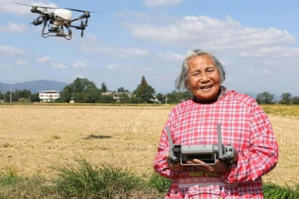 An 82-year-old Chinese grandmother is gaining fame for her drone skills in farm fertilisation and as a live-streamer selling rice, earning admiration as a role model for modern farmers. Photo: Xinhua
