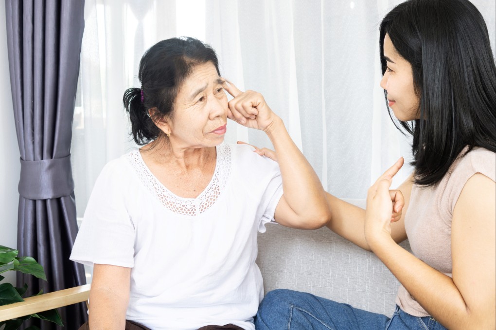 An elderly Asian woman with dementia is comforted by her daughter. A study of nearly 1,000 Singaporeans found that those showing early signs of Alzheimer’s tended to have “enlarged perivascular spaces”, or blocked glymphatic channels, the pathways through which cerebrospinal fluid washes away toxins from the brain. Photo: Shutterstock
