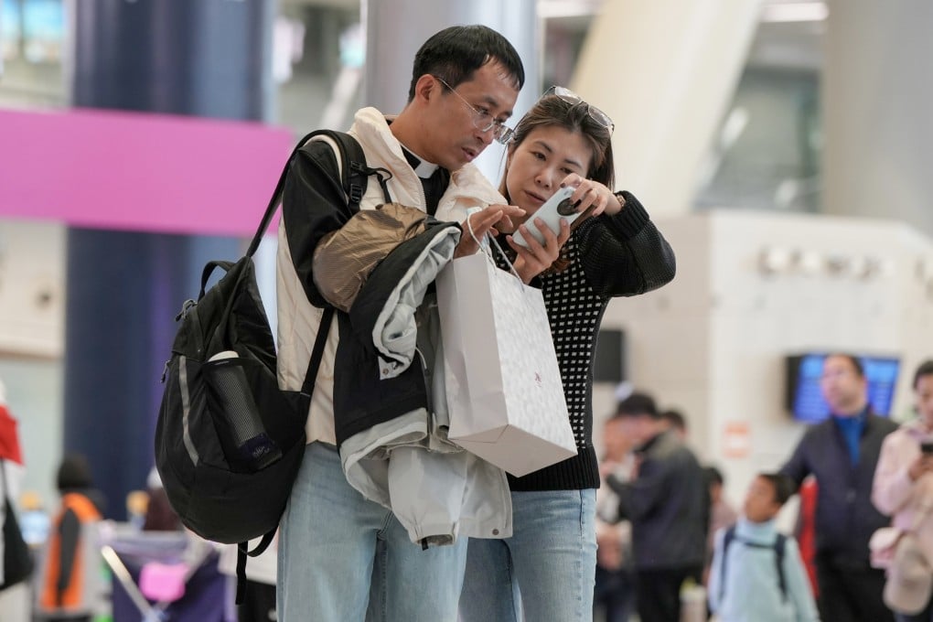 Passengers wait to depart at the ticketing concourse in Hong Kong West Kowloon Station on January 11. Photo: Sam Tsang