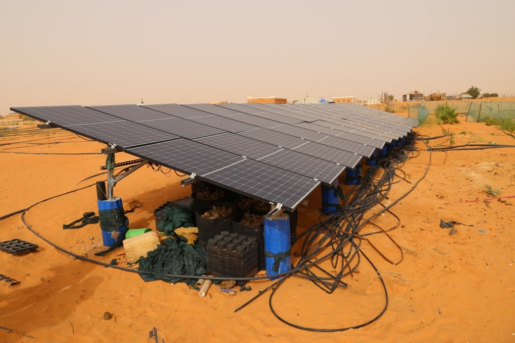 Solar panels are seen in May at the China-Africa Green Technology Park in Mauritania. Solar panels and microgrid projects built by Chinese firms in Africa have electrified local communities, according to a People’s Daily commentary. Photo: Xinhua
