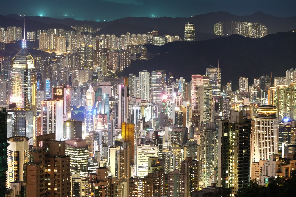 A night view of Hong Kong Island and Kowloon from The Peak. Property prices in the city are expected to trend upwards this year. Photo: Sam Tsang
