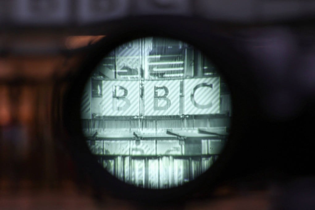 The viewfinder of a camera shows the entrance outside the offices of the BBC in London in November 2025. Photo: AFP