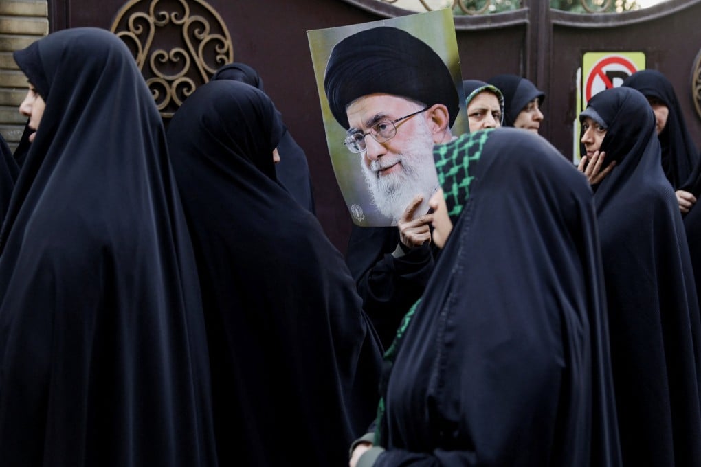 Iranians at a pro-government rally in Tehran on January 12. Photo: West Asia News Agency via Reuters